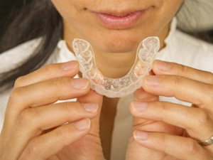 Teen girl smiling while walking to class