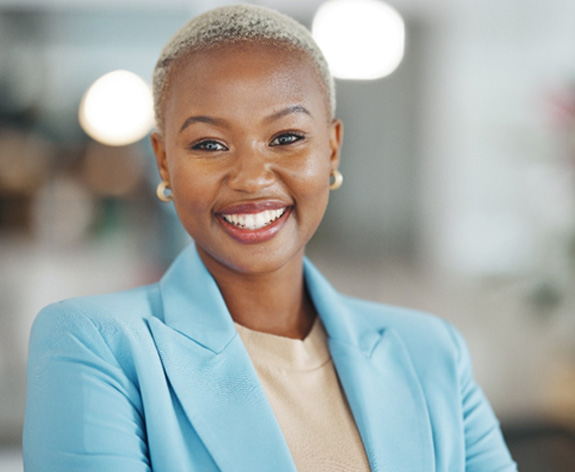 Woman in blue blazer smiling