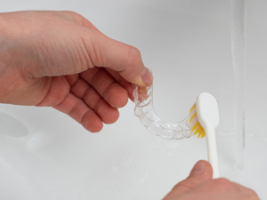 Patient cleaning clear aligner